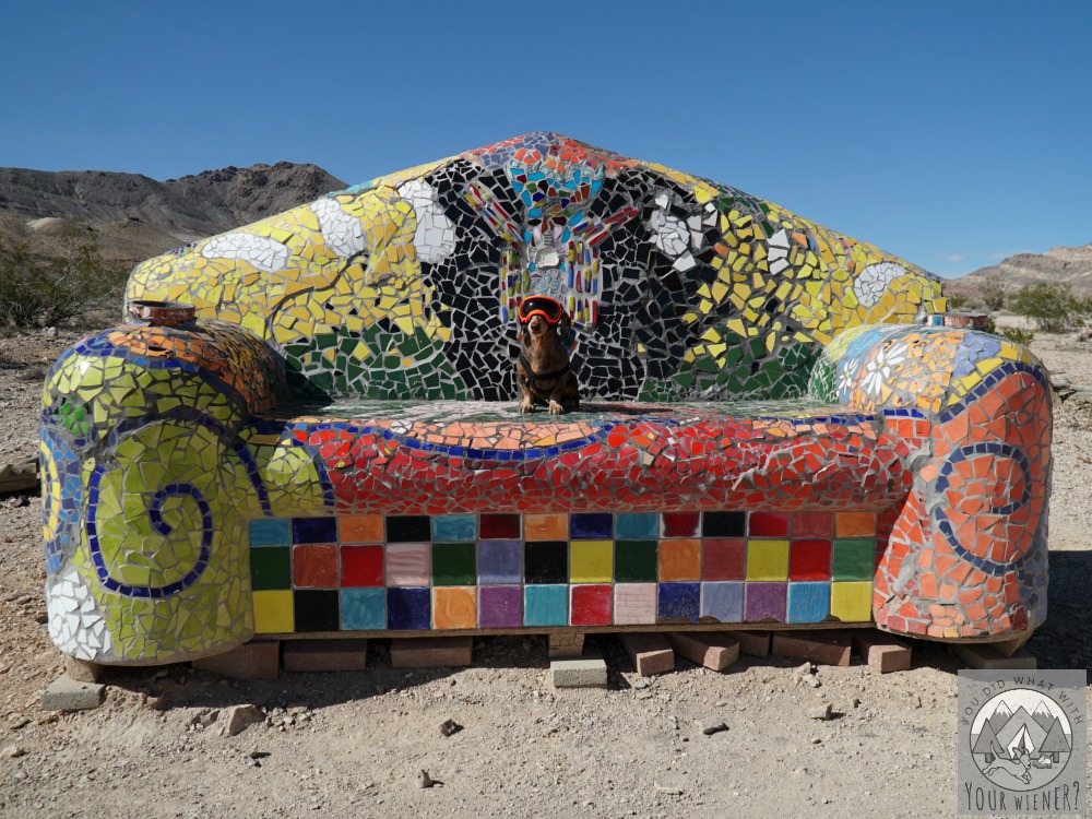 Dachshund sitting on a couch art sculpture at the Goldwell Open Air Museum